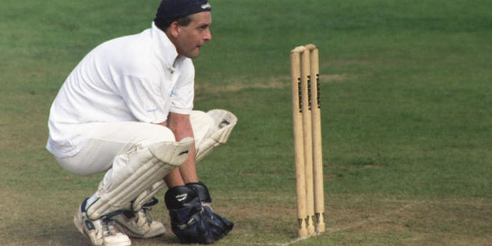 wicket keeper wearing cricket pads